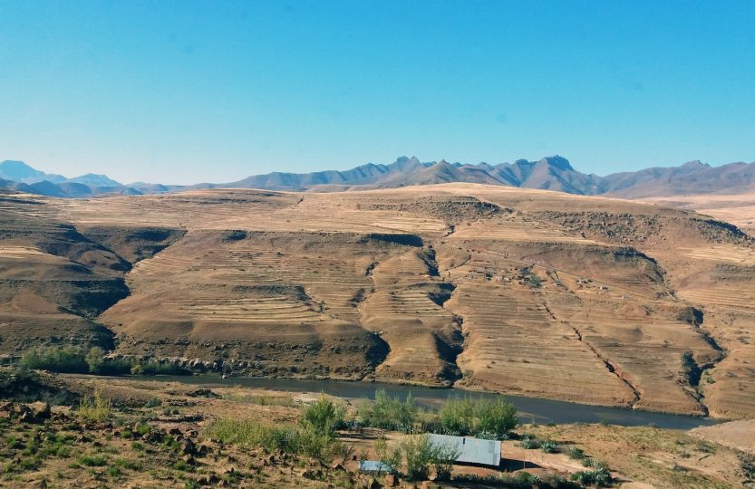 a mountain range with a river running through it