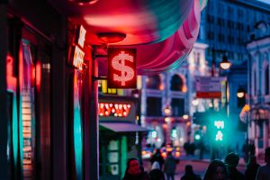 people walking on street during night time