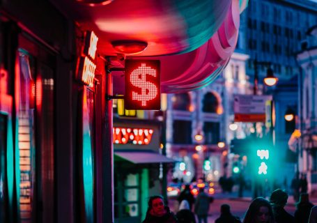 people walking on street during night time