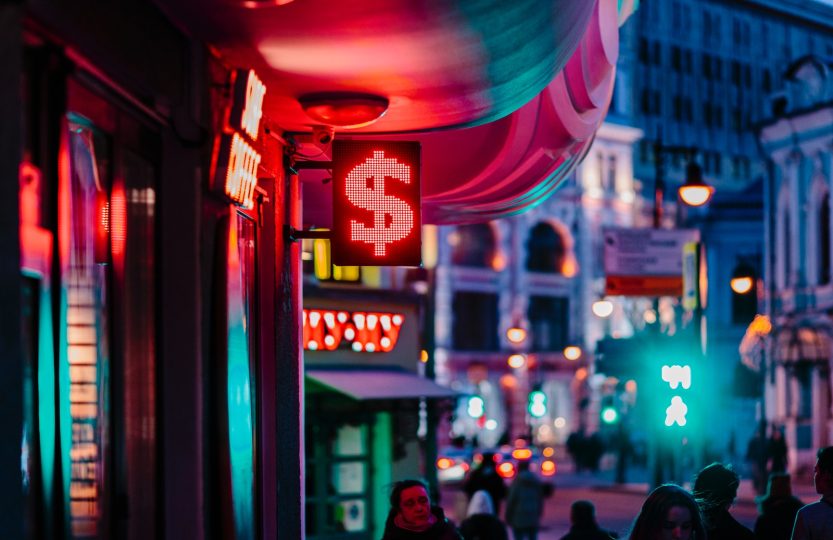 people walking on street during night time