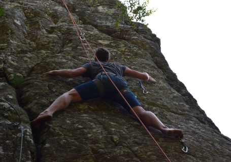 a man rock climbing